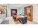 Bright dining room with tile flooring, stainless steel appliances, and elegant wooden furniture at 13456 Marble Sands Ct, Hudson, FL 34669