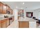 Modern kitchen with granite countertops and stainless steel appliances at 13456 Marble Sands Ct, Hudson, FL 34669