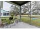 Spacious screened porch overlooking the backyard at 13540 Knotty Ln, Hudson, FL 34669