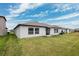 Charming home with a spacious backyard and grassy lawn at 13580 Willow Bluestar Loop, Riverview, FL 33579