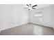 Simple bedroom with tile floors and a ceiling fan at 13580 Willow Bluestar Loop, Riverview, FL 33579