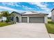 Single-Gathering home with two-car garage and solar panels at 13580 Willow Bluestar Loop, Riverview, FL 33579