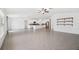 Open concept kitchen with island and stainless steel appliances at 13580 Willow Bluestar Loop, Riverview, FL 33579