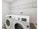 Laundry room with Samsung washer and dryer at 13580 Willow Bluestar Loop, Riverview, FL 33579