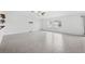 Spacious living room with tile floors and ceiling fan at 13580 Willow Bluestar Loop, Riverview, FL 33579