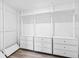 Large walk-in closet with white shelving and drawers at 13580 Willow Bluestar Loop, Riverview, FL 33579