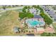 Community pool, playground, and clubhouse at 14356 Edinburgh Moor Dr, Wimauma, FL 33598