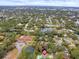 Wide aerial view showing home's location and neighborhood at 1492 Excaliber Dr, Clearwater, FL 33764