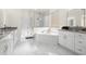 Spa-like bathroom with double vanity and walk-in shower at 15214 Octavia Ln, Odessa, FL 33556
