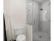 Bathroom with a toilet and a walk in shower at 15214 Octavia Ln, Odessa, FL 33556
