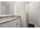Modern bathroom with granite countertop and glass shower at 15214 Octavia Ln, Odessa, FL 33556