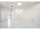 Spacious bedroom with marble floors and an ensuite bathroom at 15214 Octavia Ln, Odessa, FL 33556