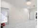 Bright bedroom with door to the backyard and marble floors at 15214 Octavia Ln, Odessa, FL 33556