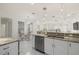 Open kitchen with island, stainless steel appliances, and granite counters at 15214 Octavia Ln, Odessa, FL 33556