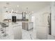 Large kitchen with an island and white shaker cabinets at 15214 Octavia Ln, Odessa, FL 33556