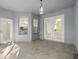 Bright lanai with tile flooring, double doors, and windows at 15214 Octavia Ln, Odessa, FL 33556