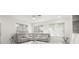 Living room with sectional sofa and marble flooring at 15214 Octavia Ln, Odessa, FL 33556