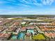 Community view with pool, tennis courts, and clubhouse at 17071 Oval Rum Dr, Wimauma, FL 33598