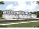 New townhome development featuring 5-unit building with 2-car garages at 17390 Moonflower Dr # 101, Venice, FL 34293