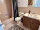 Clean bathroom with a tub, toilet, and vanity at 2042 Australia W Way # 78, Clearwater, FL 33763