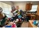 A cluttered kitchen with wooden cabinets at 307 E Althea Ave, Tampa, FL 33612