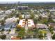 Aerial view of a townhome community with Spanish tile roofs, near the water at 3210 W Horatio St # 1, Tampa, FL 33609