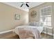 Bedroom with a double bed and a ceiling fan at 3210 W Horatio St # 1, Tampa, FL 33609