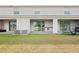 Backyard view of townhouses with patios at 34395 Sorrel Mint Dr, Wesley Chapel, FL 33543
