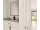 Modern bathroom with granite vanity and black matte faucet at 34395 Sorrel Mint Dr, Wesley Chapel, FL 33543