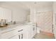 Bathroom with double vanity and shower/tub combo at 34395 Sorrel Mint Dr, Wesley Chapel, FL 33543
