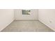 Small bedroom with window and carpet at 34395 Sorrel Mint Dr, Wesley Chapel, FL 33543