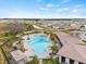 Aerial view of community pool and clubhouse at 34395 Sorrel Mint Dr, Wesley Chapel, FL 33543