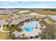 Aerial view of community pool and amenities at 34395 Sorrel Mint Dr, Wesley Chapel, FL 33543