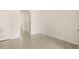 Clean and bright hallway with tile floors at 34395 Sorrel Mint Dr, Wesley Chapel, FL 33543