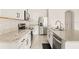 Modern kitchen with stainless steel appliances and granite countertops at 34395 Sorrel Mint Dr, Wesley Chapel, FL 33543