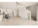 Open concept living room and kitchen with tile floors at 34395 Sorrel Mint Dr, Wesley Chapel, FL 33543