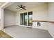Covered patio with sliding glass doors at 34395 Sorrel Mint Dr, Wesley Chapel, FL 33543