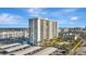 High-rise building near water with parking and pool at 400 Island Way # 903, Clearwater Beach, FL 33767