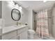 Updated bathroom with a walk-in shower and modern vanity at 400 Island Way # 903, Clearwater Beach, FL 33767