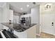 Modern kitchen with granite countertops and stainless steel appliances at 4221 W Spruce St # 1404, Tampa, FL 33607