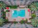Overhead view of a community pool with lounge chairs at 4221 W Spruce St # 1404, Tampa, FL 33607