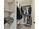 Large walk-in closet with ample shelving and hanging space at 4221 W Spruce St # 1404, Tampa, FL 33607