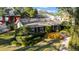 Home with lush landscaping, located near shops and restaurants at 4307 W Kensington Ave, Tampa, FL 33629