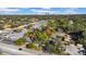 Property location shown from above, near a main road and businesses at 4307 W Kensington Ave, Tampa, FL 33629