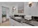 Bathroom with granite countertop and double sink vanity at 4307 W Kensington Ave, Tampa, FL 33629