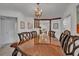 Elegant dining room with a large wood table and chandelier at 4307 W Kensington Ave, Tampa, FL 33629