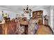 Spacious dining room with hardwood floors and wood furniture at 4307 W Kensington Ave, Tampa, FL 33629