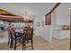 Open dining room with a chandelier and access to kitchen at 4307 W Kensington Ave, Tampa, FL 33629