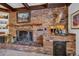 Brick fireplace with built-in bar and storage at 4307 W Kensington Ave, Tampa, FL 33629