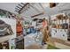 Organized garage with ample storage and fishing rod rack at 4307 W Kensington Ave, Tampa, FL 33629